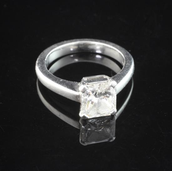 A platinum and solitaire diamond ring, size M.